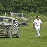 "Hutch" hands out another  checkered flag.